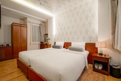 Habitación Deluxe doble o twin — Ace Hotel Ben Thanh
